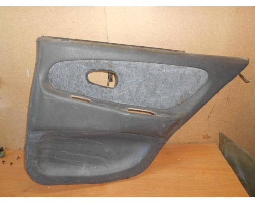Обшивка двери задняя правая Mitsubishi Lancer VI 1991-2000 ()- купить на ➦ А50-Авторазбор по цене 600.00р.. Отправка в регионы.