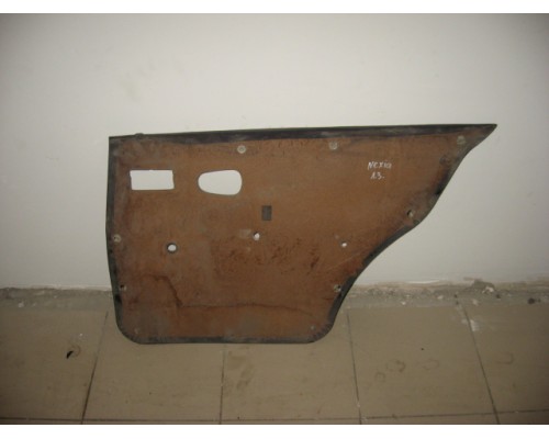 Обшивка двери задняя левая Daewoo Nexia 1995-2016 ()- купить на ➦ А50-Авторазбор по цене 250.00р.. Отправка в регионы.