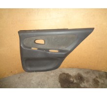 Обшивка двери задняя правая Mitsubishi Colt 1992-1996